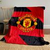 Diagonal red and black zigzag pattern with a central Manchester United logo. for all seasons blanket lunch break throw gift