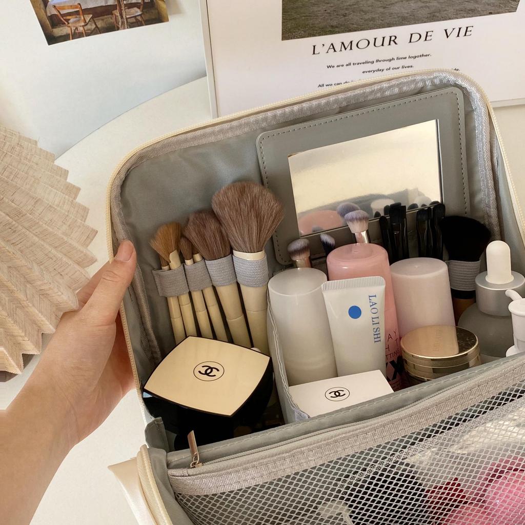 Portable Large Capacity Makeup Bag with Mirror, Hangable on Suitcase, Compartmentalized Cosmetic Storage Pouch.