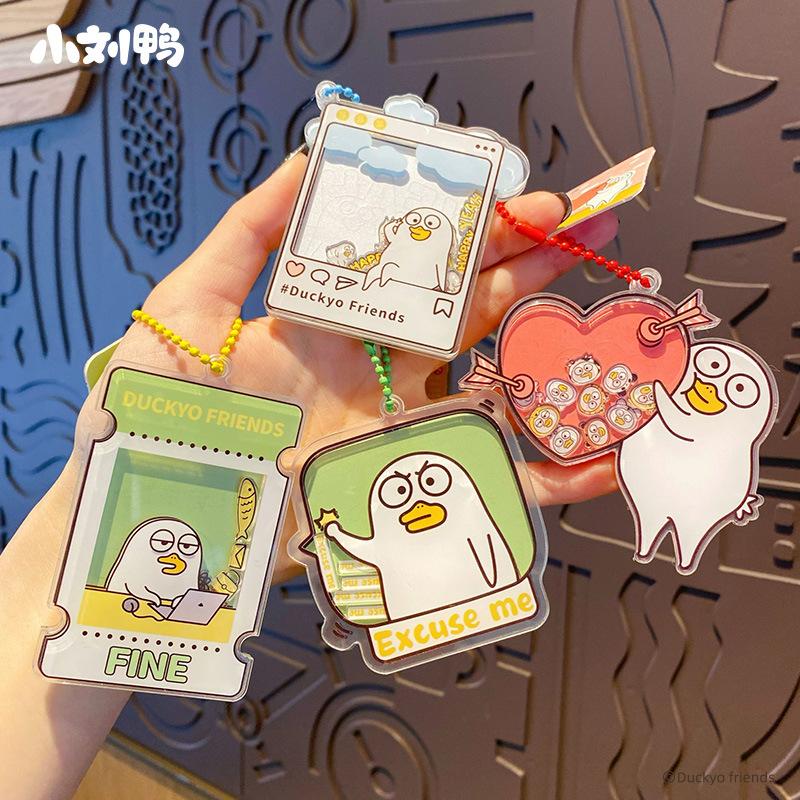 Kleiner Liu Ente Schlüsselanhänger kreativ Acryl Schaukelmusik niedliches Dekompressionsspielzeug Schlüsselring Kette Schultaschenanhänger