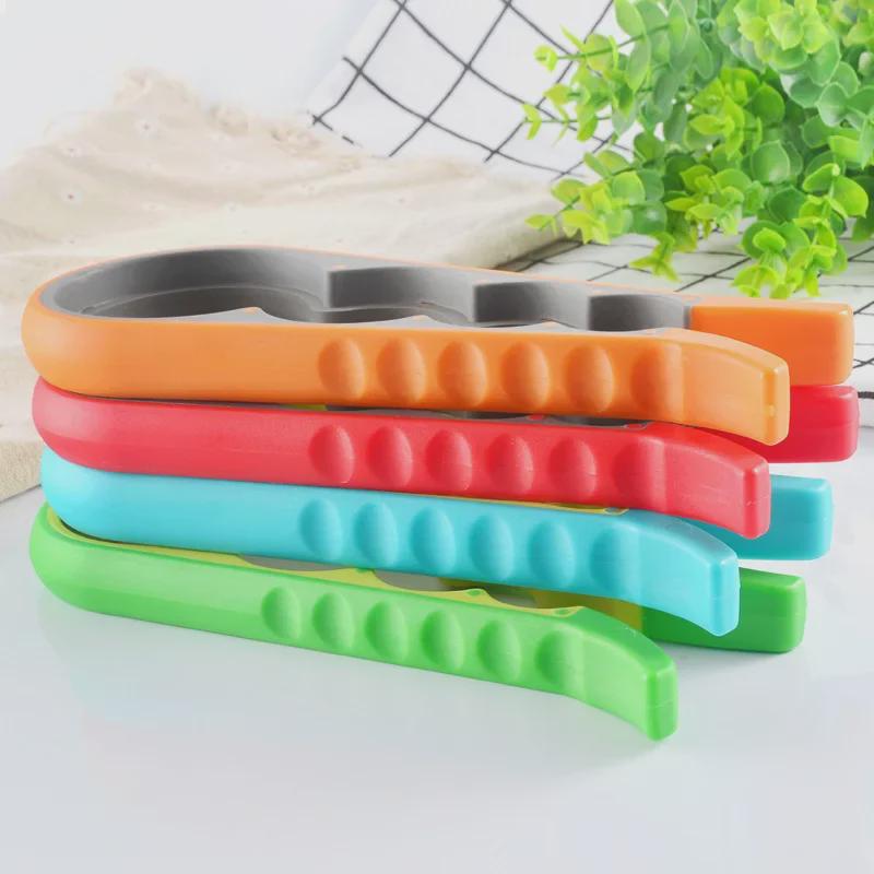 Deschizător de sticle și conserve multifuncțional patru în unu cu mâner antiderapant