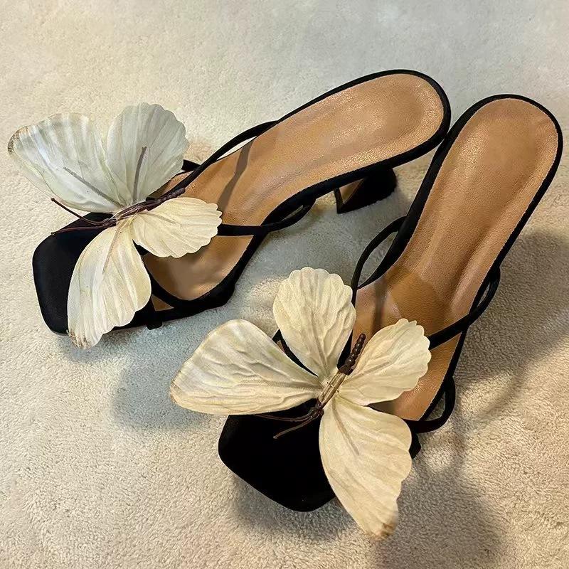 

Spot cowhide handmade butterfly one-word drag girl, new niche fairy thick heel sandals 40 чорний