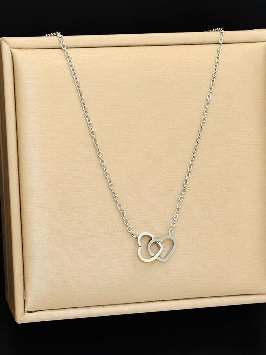 

Ожерелье-двойное кольцо-сердце из титана с покрытием из 18-каратного золота - Минималистичный и универсальный дизайн для женщин