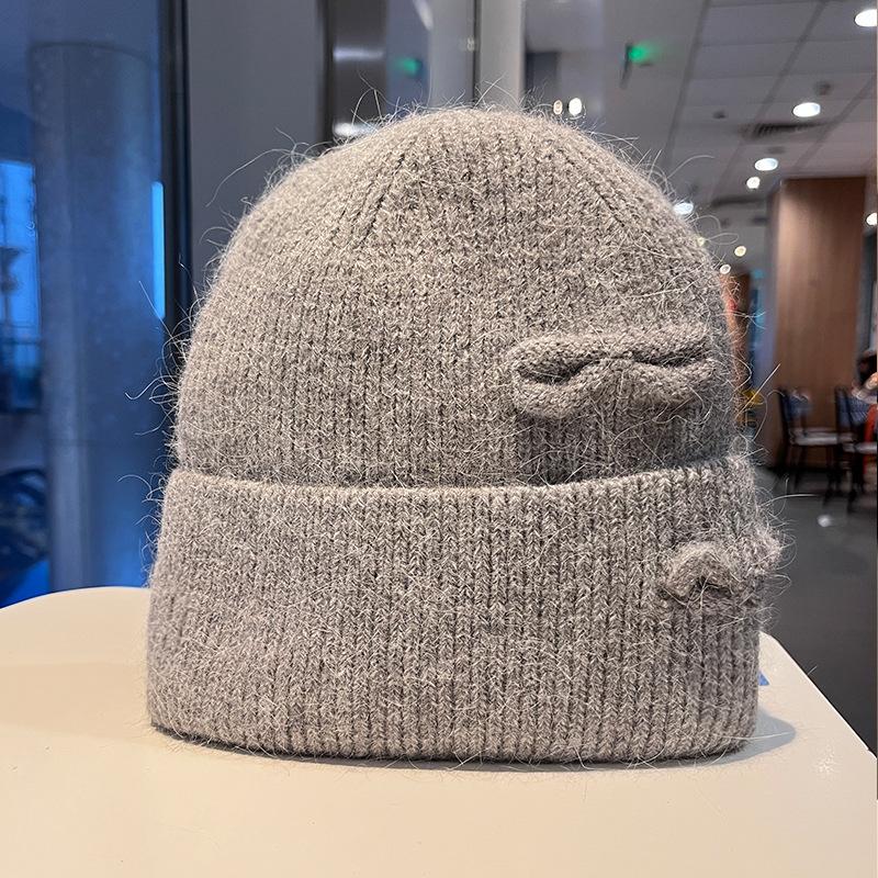 Korean version of fashion hole knitted wool hat men and women autumn and winter outdoor warm bag head cold hat lazy knitted hat