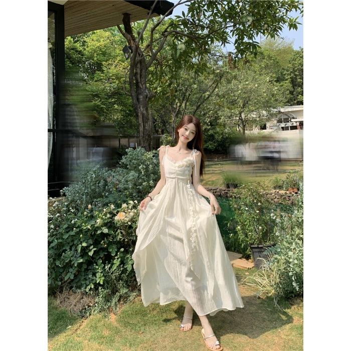 Holiday style flower design suspender dress women's 2026 summer new waist thin very fairy long skirt
