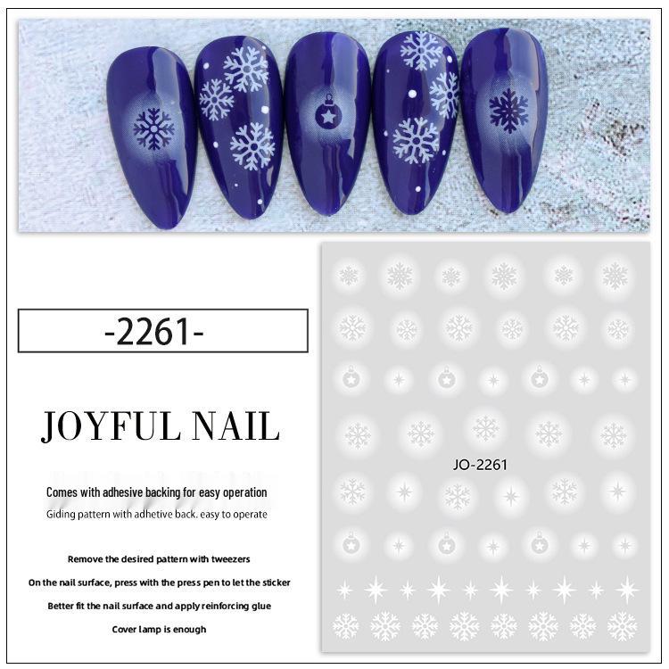 Winter-Schneeflocken-Nagelaufkleber: Festliche weiße Hohlmuster für saisonale Nagelkunst