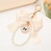 Fashionable Pearls Embellished Bows Bag Accessory Versatile Keychain Pendant Hanging Decoration For Purses