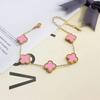 Bracciale da donna a fascia con conchiglia double-face e quadrifoglio, resistente ai colori, alla moda e di alta gamma