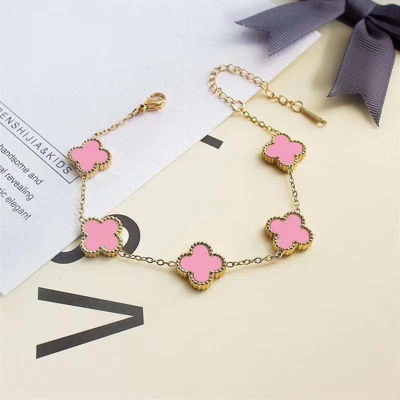 Bracciale da donna a fascia con conchiglia double-face e quadrifoglio, resistente ai colori, alla moda e di alta gamma