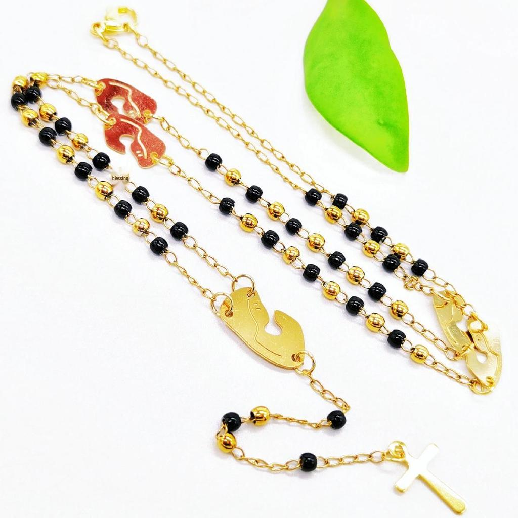 Schwarze Kreuzkette mit Goldakzenten, Multi-Accessoire - Edelstahl-Rundperlen-Schutzkette für Damen