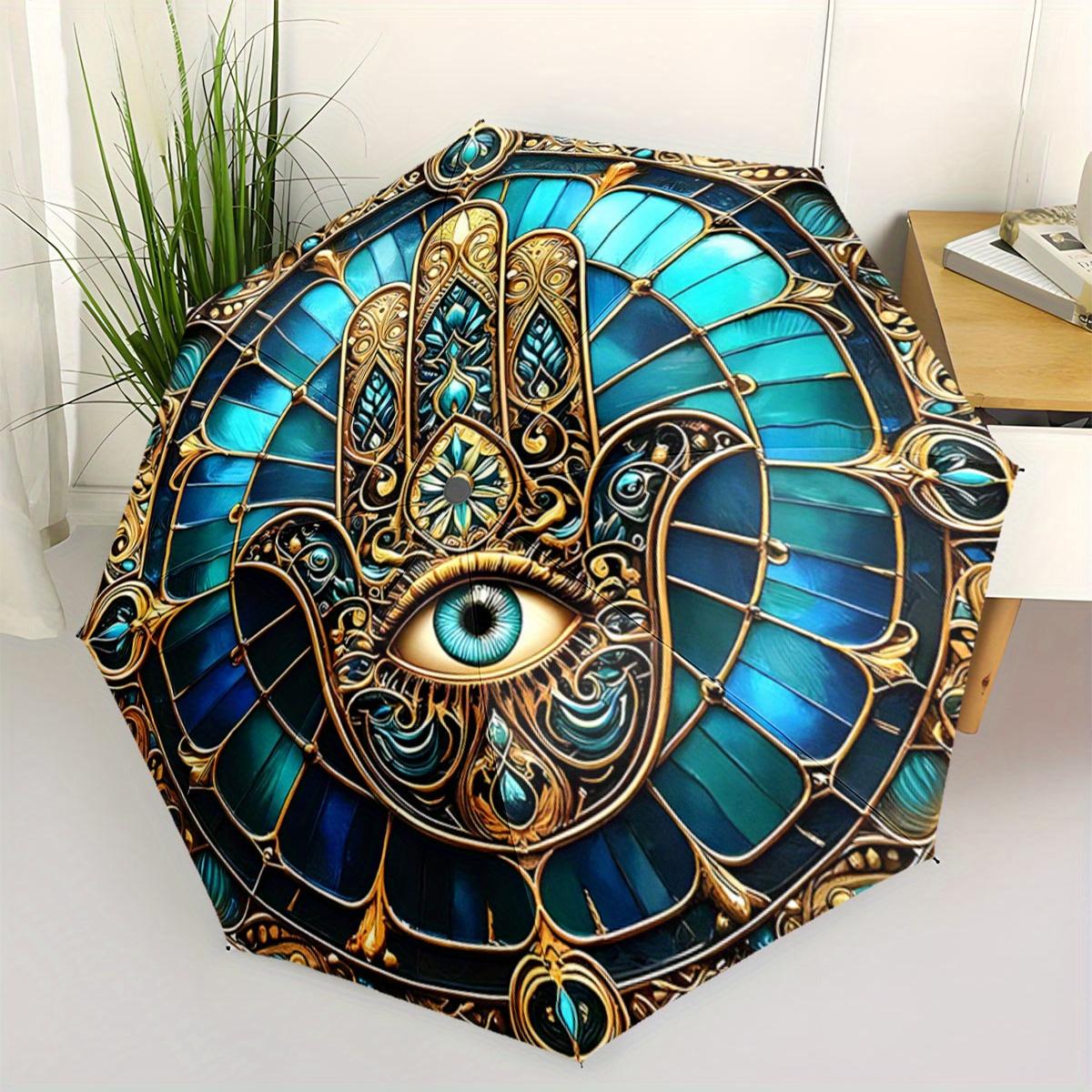 

Automatic Folding Umbrella Intricate hamsa design with a central eye motif in and Golden. Portable collapsible design, casual (as the picture,iron&8K)