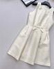 Elegant Sleeveless Spring Dress with Bow Decoration