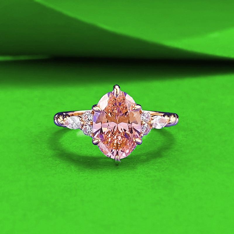 

Zhu Zhi Fan S925 Silver Oval Padparadscha Ring with Twisted Edge Size 5