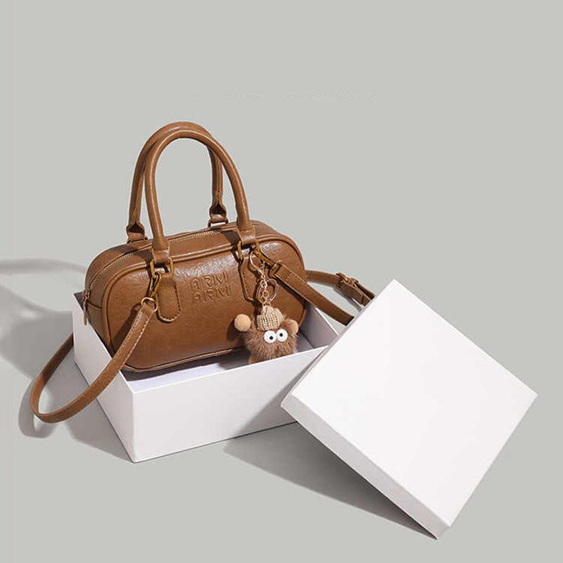 

Сумка Жіноча Сумка Нішева Ретро Сумка для боулінгу Портативна На плече Сумка-месенджер Багаж коричневий