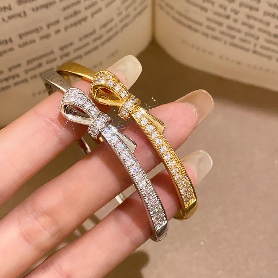 18k Gold Plated Oval Bracelet with Diamond Inlay - Butterfly Knot Design