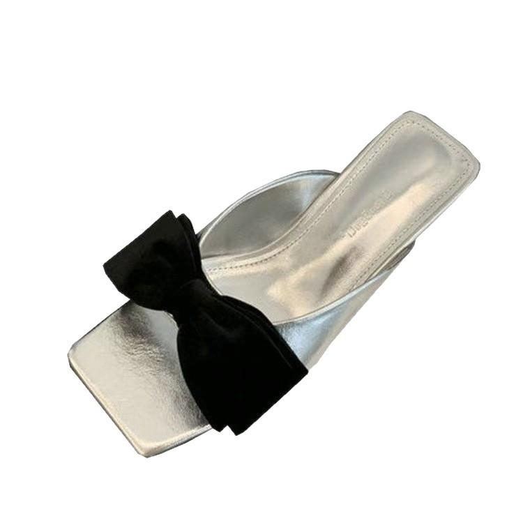 In the summer of 2025, the new bow-tie medium heel one-word slippers women's fashion outer wear square head small heel cool slippers