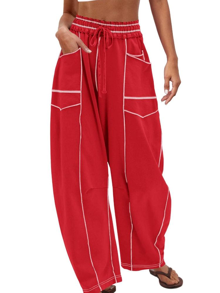 Dámské béžové kalhoty se širokými nohavicemi se stahovací šňůrkou v pase a bočními kapsami