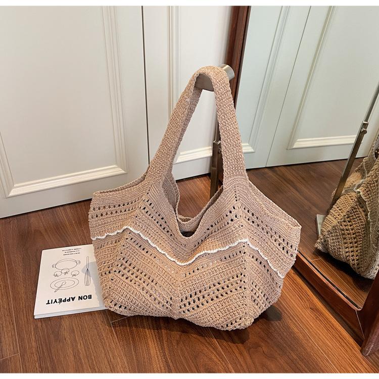 

Woven shoulder bag hand-woven niche hollow tote bag commuter shoulder seaside vacation women s bag