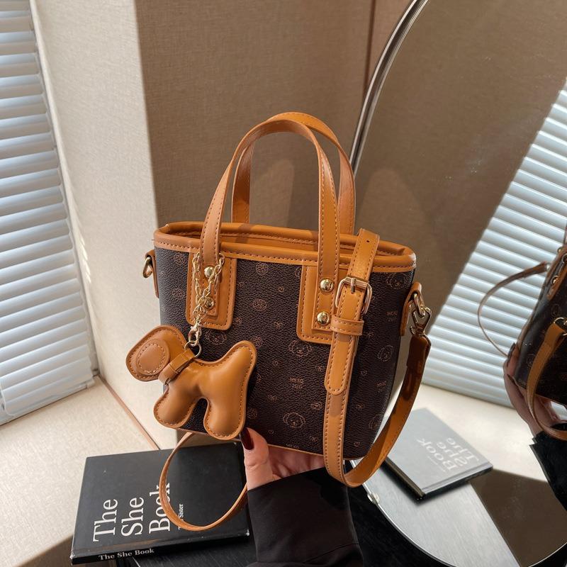 Hand-Eimer-Tasche mit Cartoon-Bärendruck, modische Umhängetasche, neue High-End-Umhängetasche