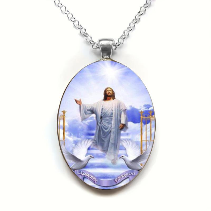 A vintage style Christian Jesus resurrection pendant angel wings glass pendant necklace fashion accessory, a perfect holiday gift for any occasion