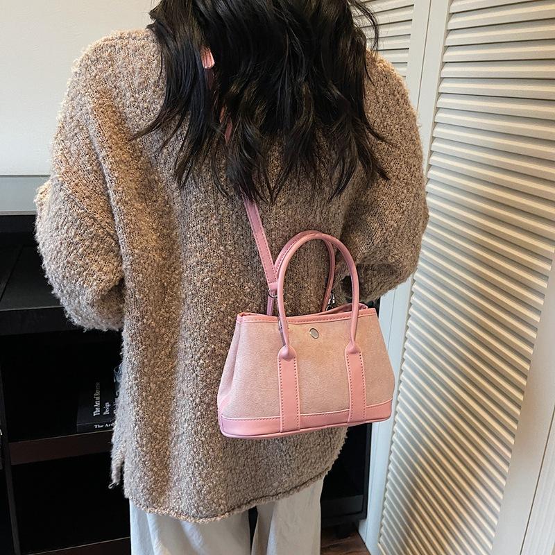 

Ретро замшевая женская сумка 2025 осень и зима новая сумка-мессенджер для通勤 леопардовый принт универсальная сумка-ведро розовый