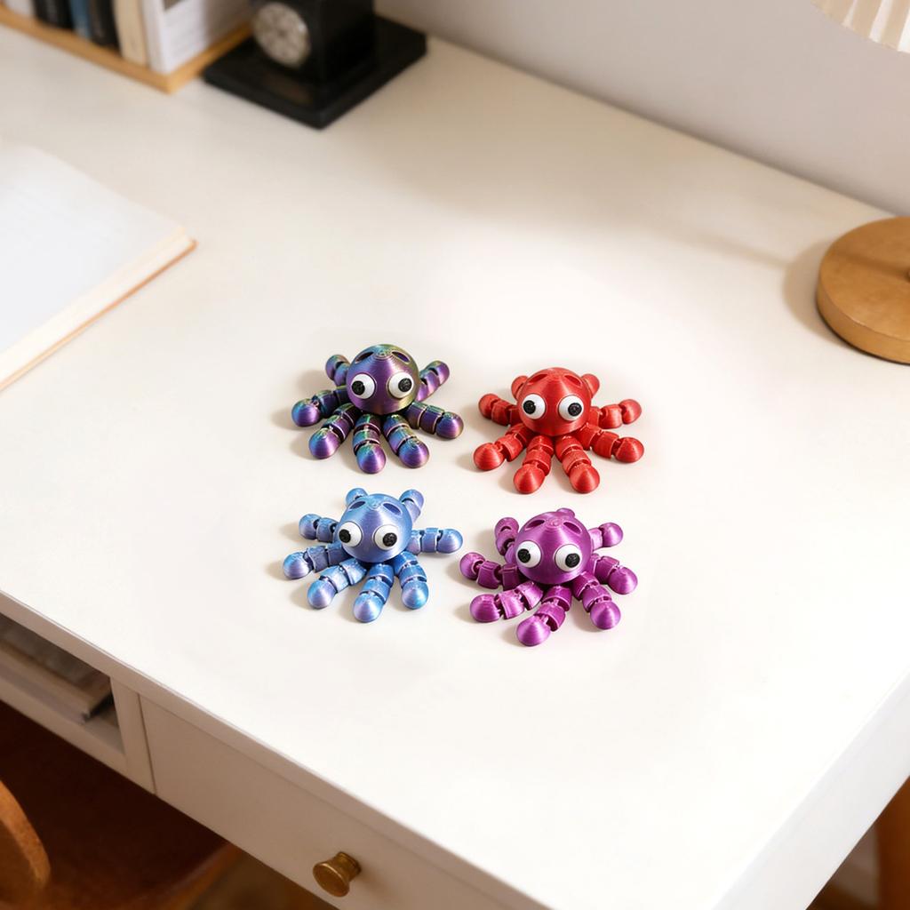 3D Printed Ornaments That Can Be Hung Backpacks Or School Bags; Squid And With Movable Joints.