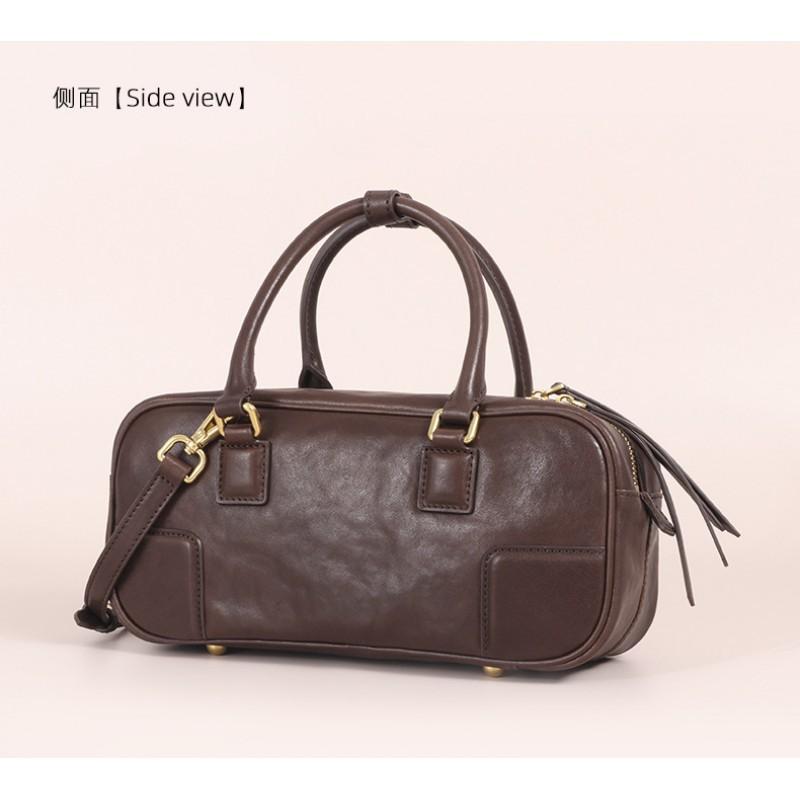 New Vegetable Tanned Leather Pillow Bag Women's Retro Niche Handbag Fashionable High-end Commuter Portable Boston