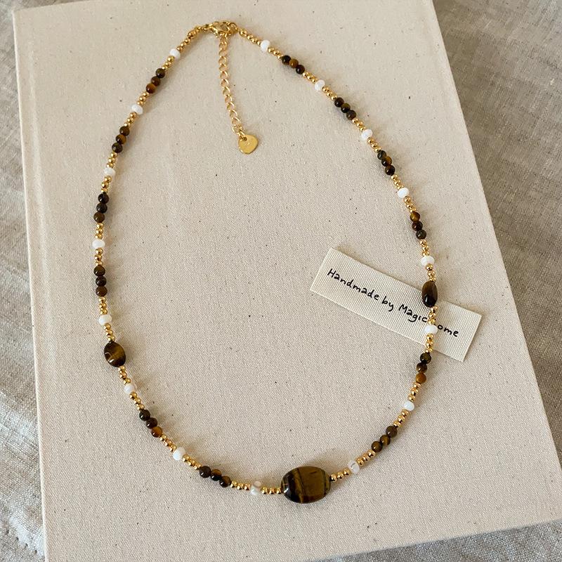 

Элегантное колье-чокер из бусин тигрового глаза - Ретро, Универсальное, Уникальный дизайн для женщин