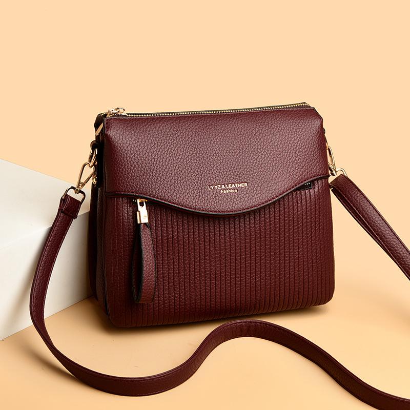 Eine Nischendesign Kleine Quadratische Tasche, Eine Modische Einzel-Schultertasche für Mütter mittleren Alters, und Eine Lässige Umhängetasche