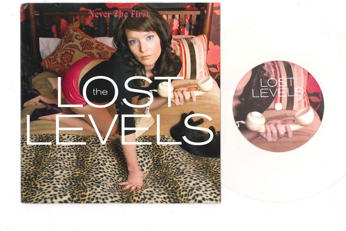 

7inch Record LOST LEVELS - Never The First NR337 NR ONE 2008 UK Rock Used