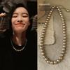 French Retro High-End Pearl Sweater Necklace with Unique Design