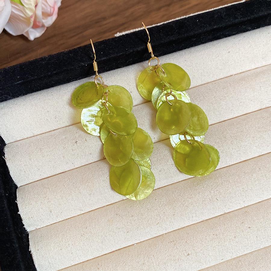 French Round Shell Tassel Stud Earrings: Retro, Exaggerated Style for a Unique Fashion Statement.