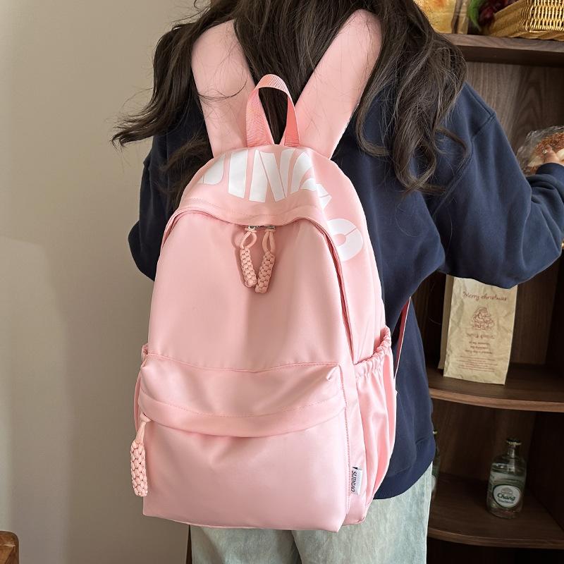 Hochwertiger modischer einfacher Buchstaben-Print lässiger Rucksack Schüler vielseitig große Kapazität Pendlerrucksack