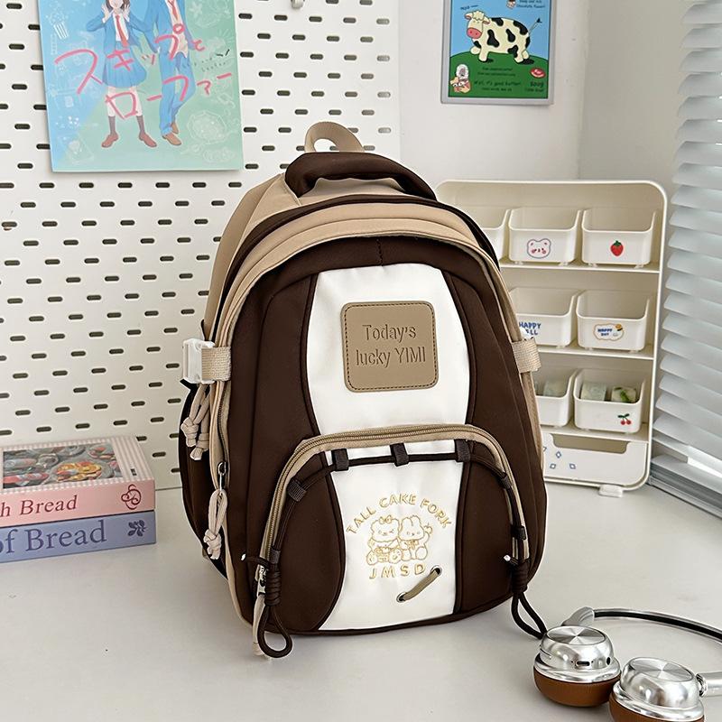 

Contrasting color backpack women s large-capacity leisure junior high school high school students class schoolbag trend lightweight travel backpack