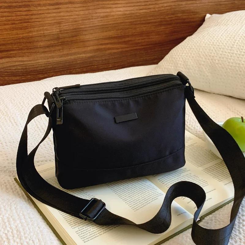 

Нейлоновая ткань Классическая маленькая квадратная сумка Корейская повседневная универсальная модная сумка Высококачественная многослойная водонепроницаемая сумка чёрный