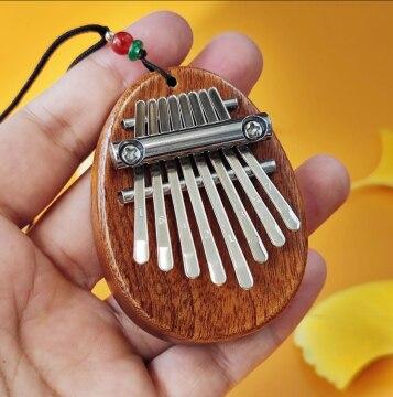 1Pcs Wood Mini Thumb Piano Musical Playthi High Quality Durable Design Safe for Children ngs 8 Tones Portable Beginner Finger Piano