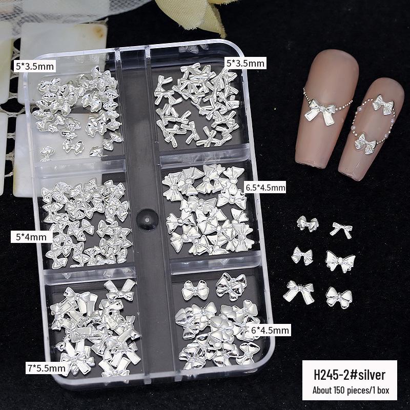 

Французские сплавные бантики для украшения ногтей - Набор из 6 секций с мини-металлическими заклепками в виде бабочек