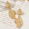 Exaggerated pleated personalized geometric earrings, simple irregular inlaid zircon stud earrings.