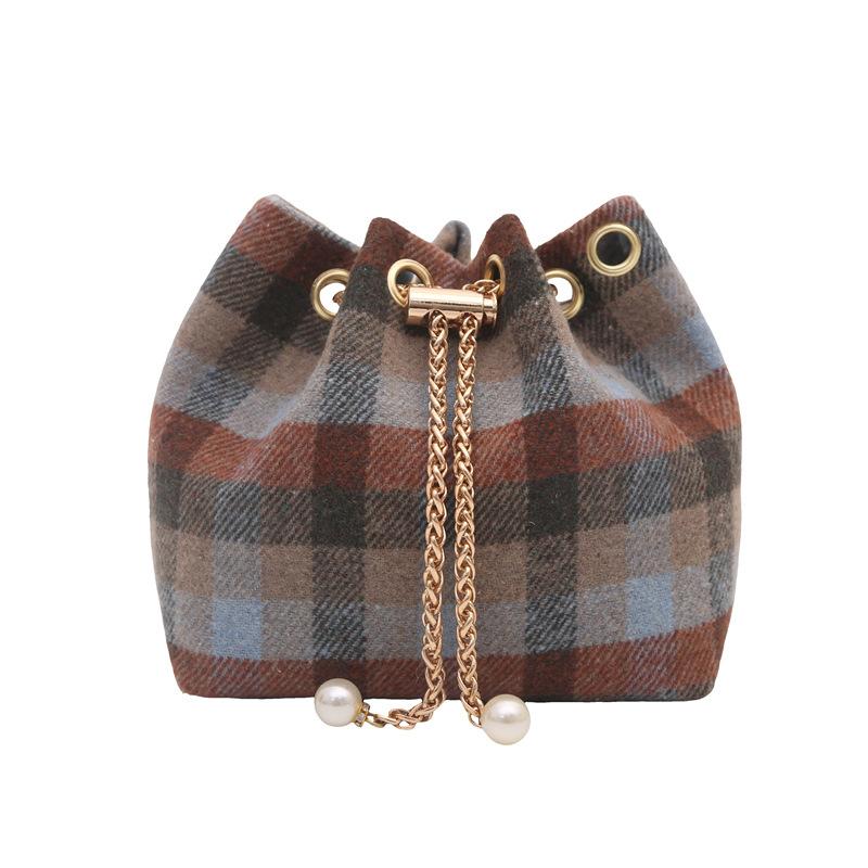 

Bag women s spring new casual personalized messenger bag fashionable simple shoulder bag retro personalized bucket bag синій