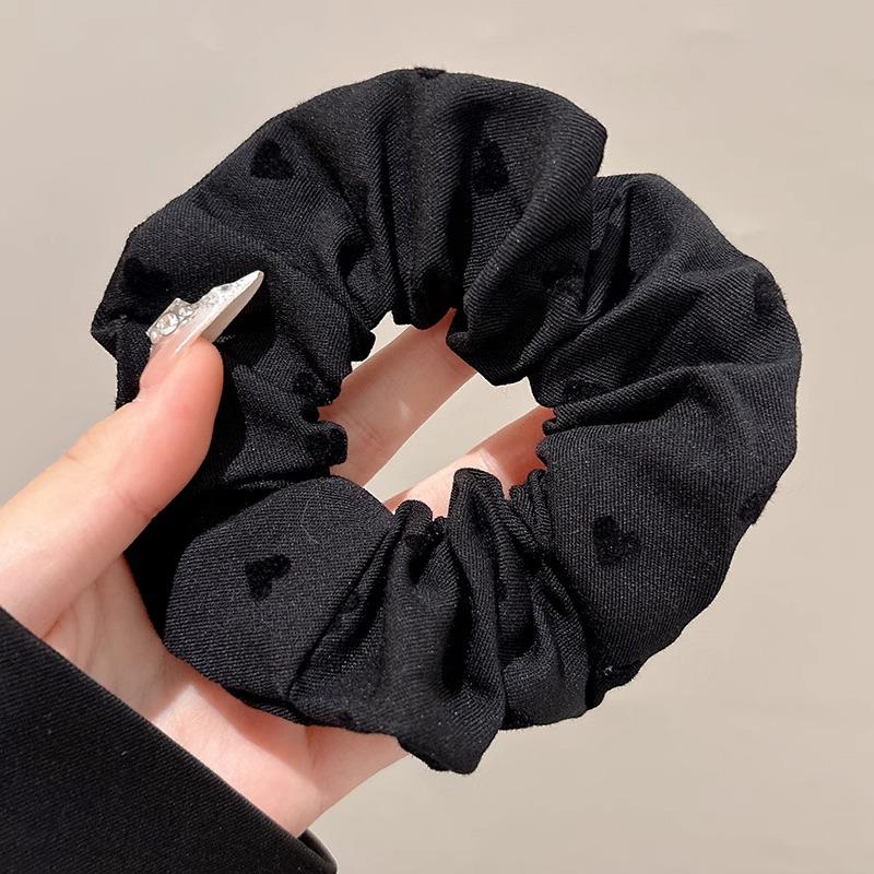 Alleskombinierbares graues Haargummi mit Schleife und Polka Dots