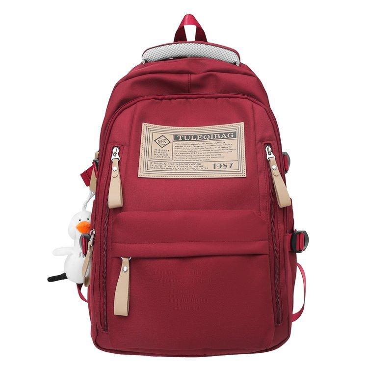 

Мужской рюкзак большой емкости Женский однотонный школьный рюкзак для школьников младших классов красный