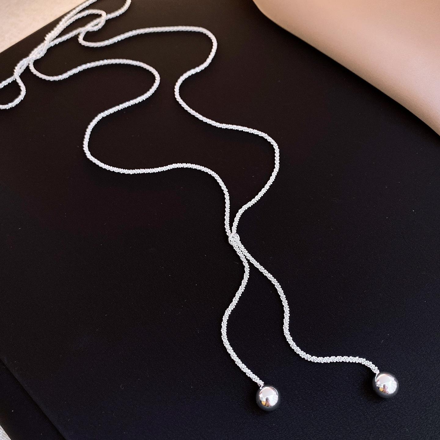 Korean cold wind round pendant pull-out necklace simple sweater chain light luxury item decoration