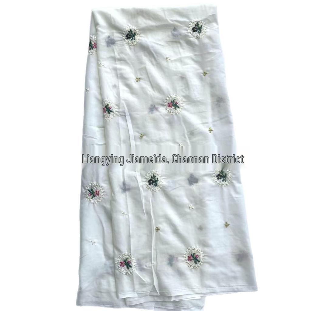 Light Apricot Cotton Fabric with Small Embroidered Flowers - Fresh Style for Women's Clothing and Children's Bags.