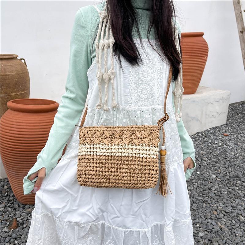 Woven straw bag women's versatile new spring and summer shoulder messenger bag seaside beach bag