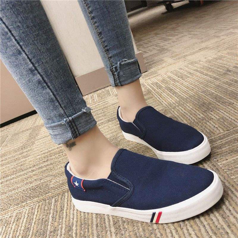 Segeltuchschuhe Frühling flach Ein-Pedal faule Schuhe Board Schuhe Trend