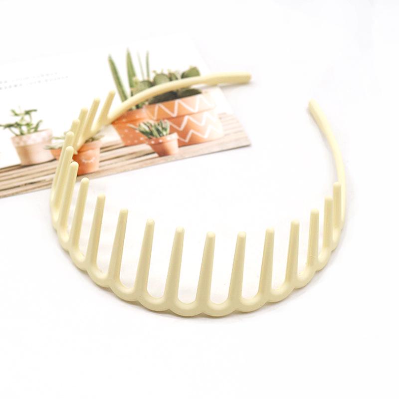 Buntes, wellenförmiges koreanisches Zahnkamm-Haarband - Rutschfest, schonend zum Haar, Bequemer Sitz, Ideal zum Bändigen von Babyhaaren.