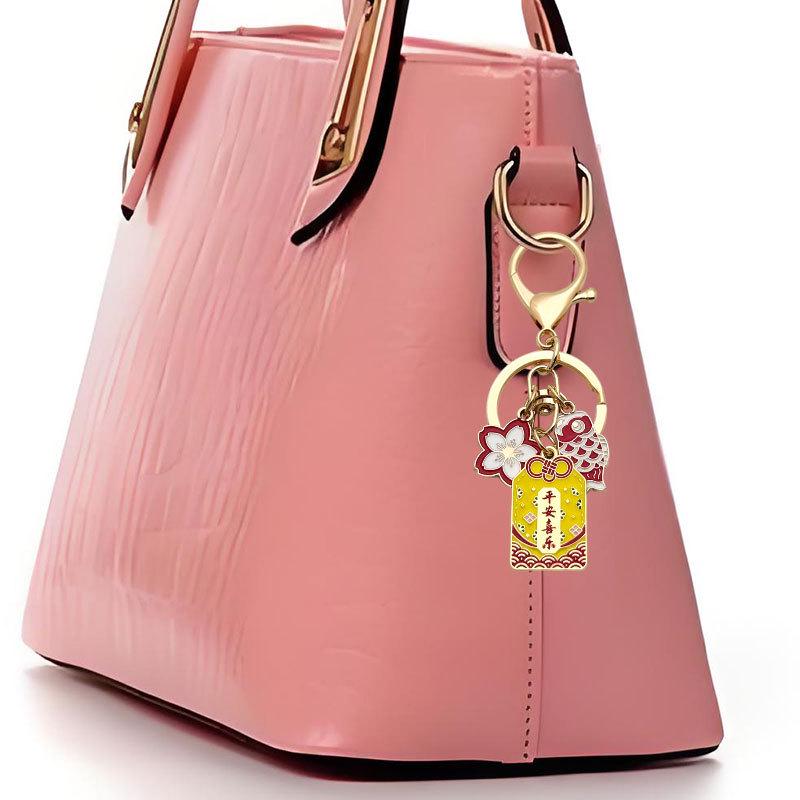 Japanese Sakura Koi Omamori Amulet Keychain for Luck, Wealth & Safety - Charming Couple's Accessory