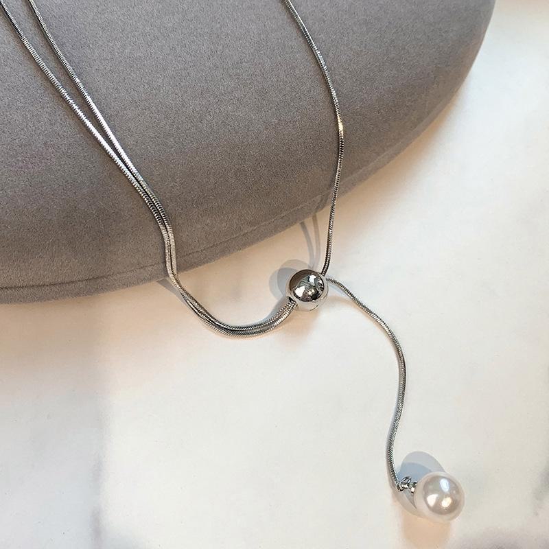 

Женское ожерелье-свитер с длинными кисточками и белым жемчугом Shijiaao RF331 серебряный