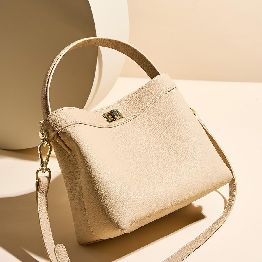 Commuter Leather Handbag New Versatile Niche Design Bucket Bag Shoulder Messenger Women's Bag