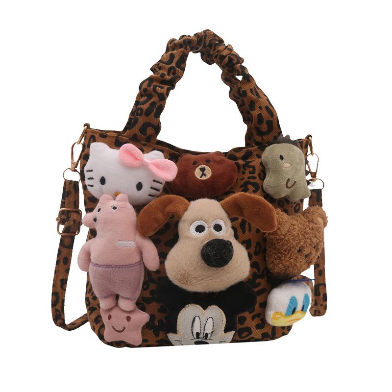 

Women s bag super fire niche leopard print canvas bag autumn and winter popular versatile messenger bag cute cartoon portable bucket bag