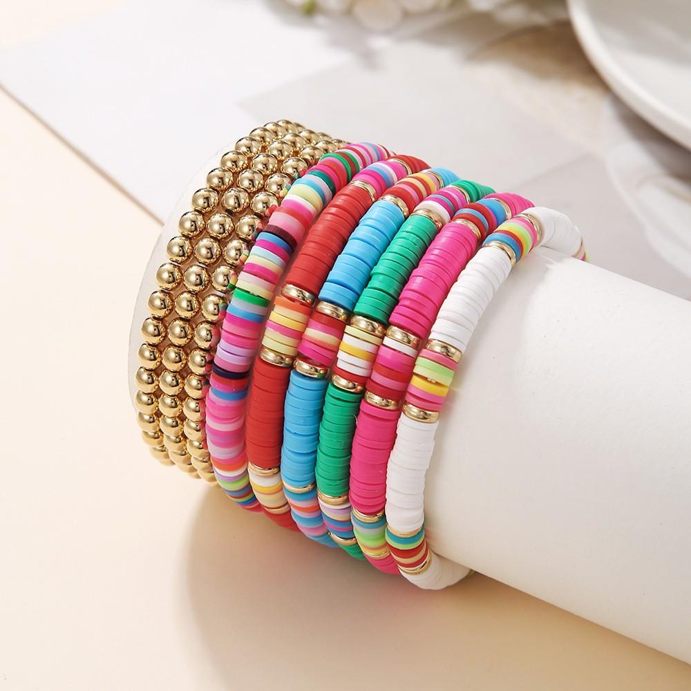 Korean version of fashion new multi-layer elastic thread soft pottery love smiley face bracelet set retro handmade pearl jewelry women